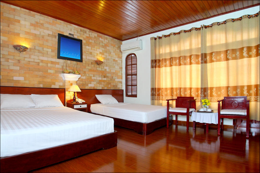 Nhi Trung Hotel Хоян Номер фото